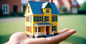 a hand holding a hause toy